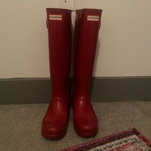 Red tall glossy Hunter boots